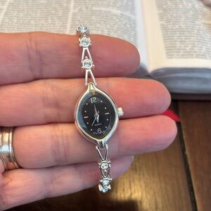 Avon Vintage Silver Tone and Rhinestone Women's Watch with Black Dial